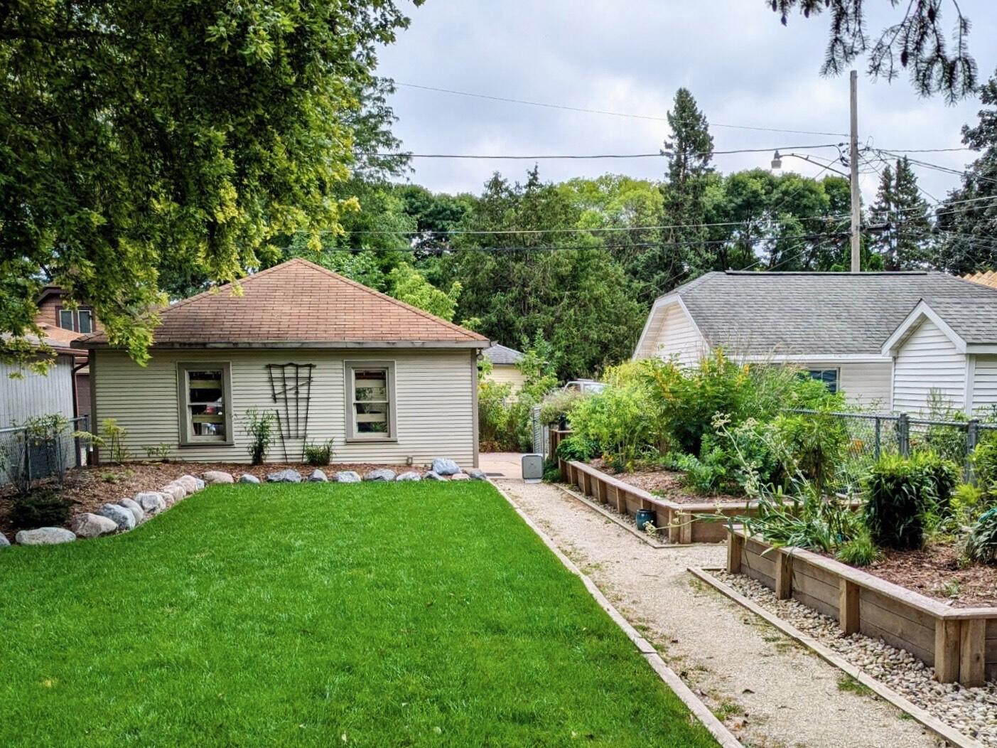 1218 North Hawley Road Milwaukee, WI 53208 - Photo 3 of 4 Backyard with 2-car garage