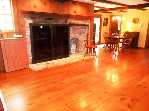119 Service Road Sandwich, MA 02537 - Photo 13 of 29 a view of a patio with dining table and chairs
