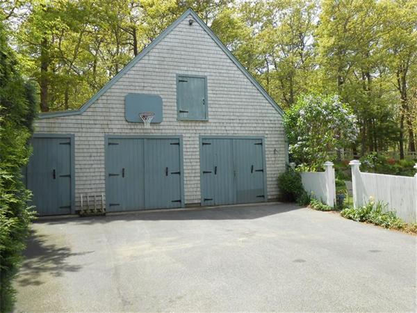 119 Service Road Sandwich, MA 02537 - Photo 29 of 29 a view of a house with a garage