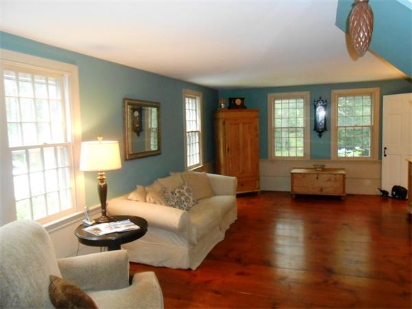 119 Service Road Sandwich, MA 02537 - Photo 5 of 29 a living room with furniture and a fireplace