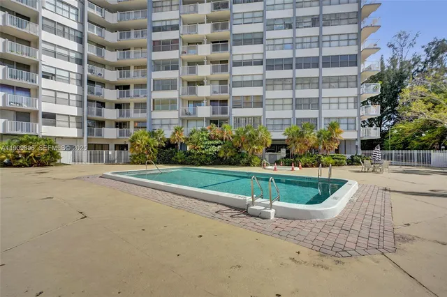 a view of a lake with building in front of it