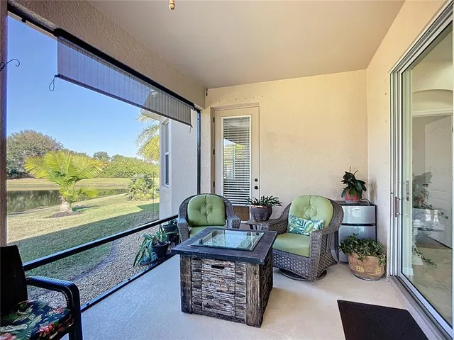 an aerial view of a house with a swimming pool