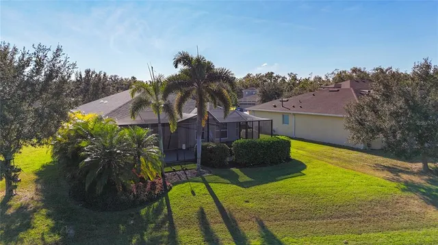 an aerial view of a house with a garden