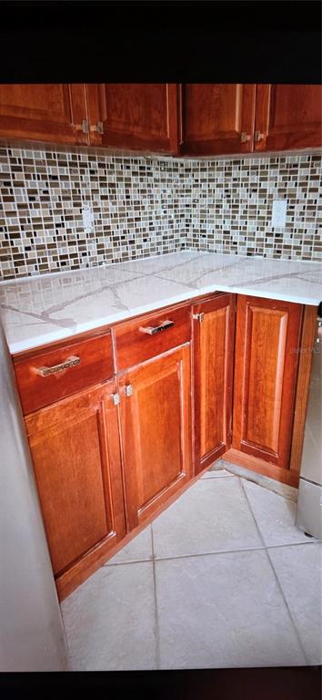 5208 Florida Road Venice, FL 34293 - Photo 8 of 12 a view of kitchen with wooden floor