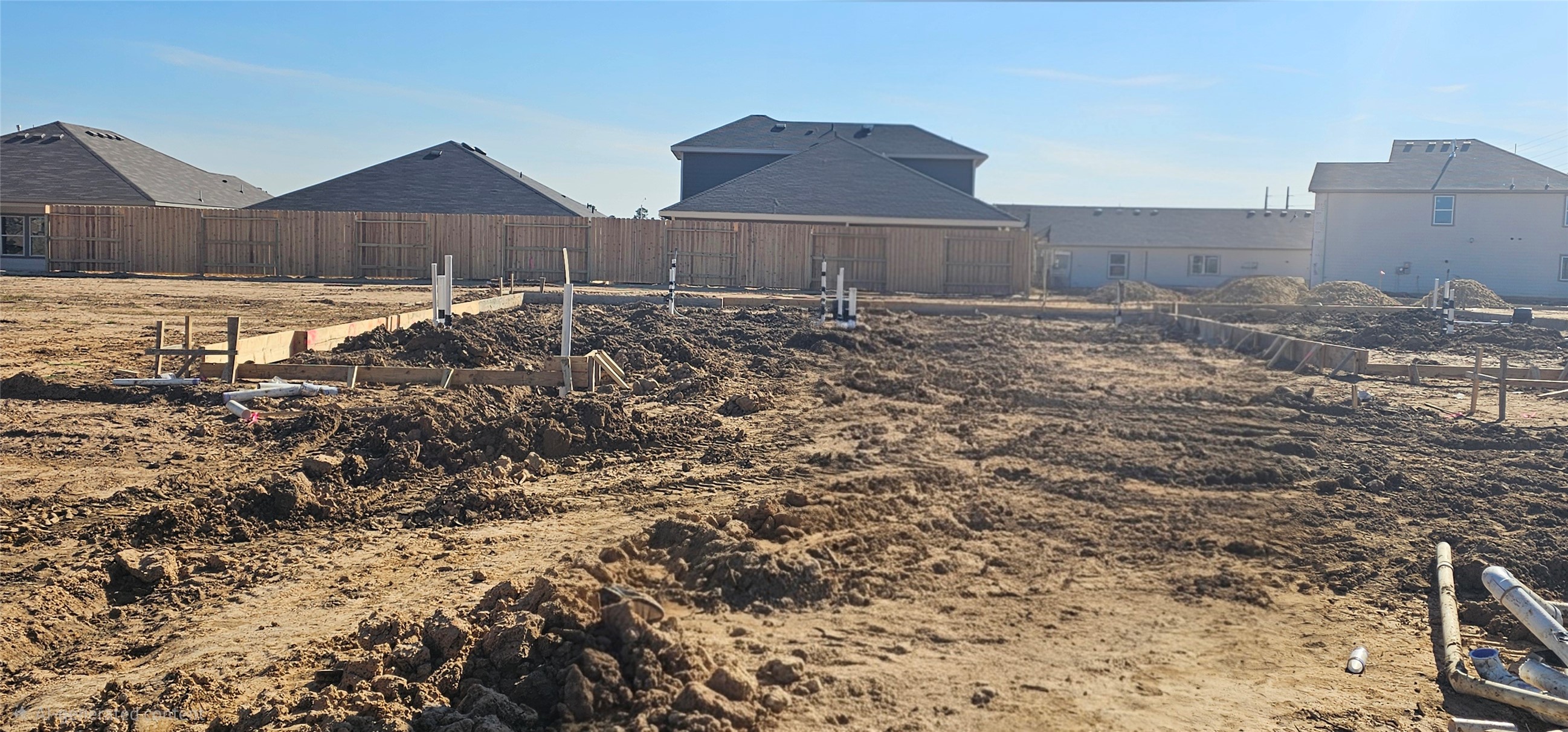 140 Rising Cedar Lane Hockley, TX 77447 - Photo 2 of 24 a view of a yard with wooden fence