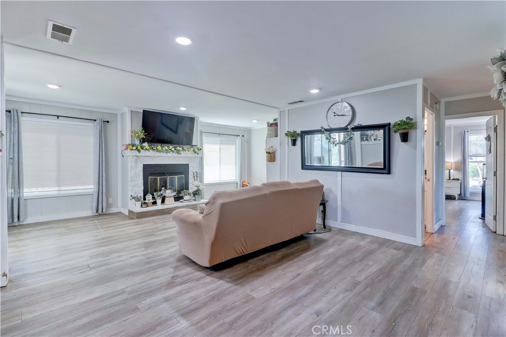 480 Deerhill Road Perris, CA 92570 - Photo 14 of 39 a living room with furniture and a flat screen tv
