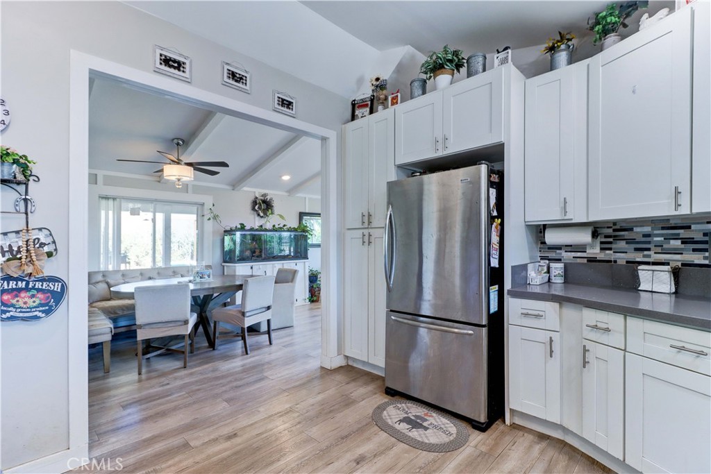 480 Deerhill Road Perris, CA 92570 - Photo 31 of 39 a kitchen with stainless steel appliances a refrigerator stove microwave and cabinets