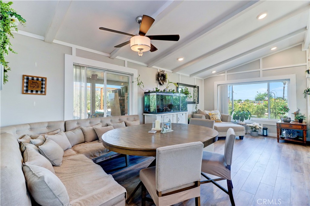 480 Deerhill Road Perris, CA 92570 - Photo 33 of 39 a living room with furniture kitchen view and a large window