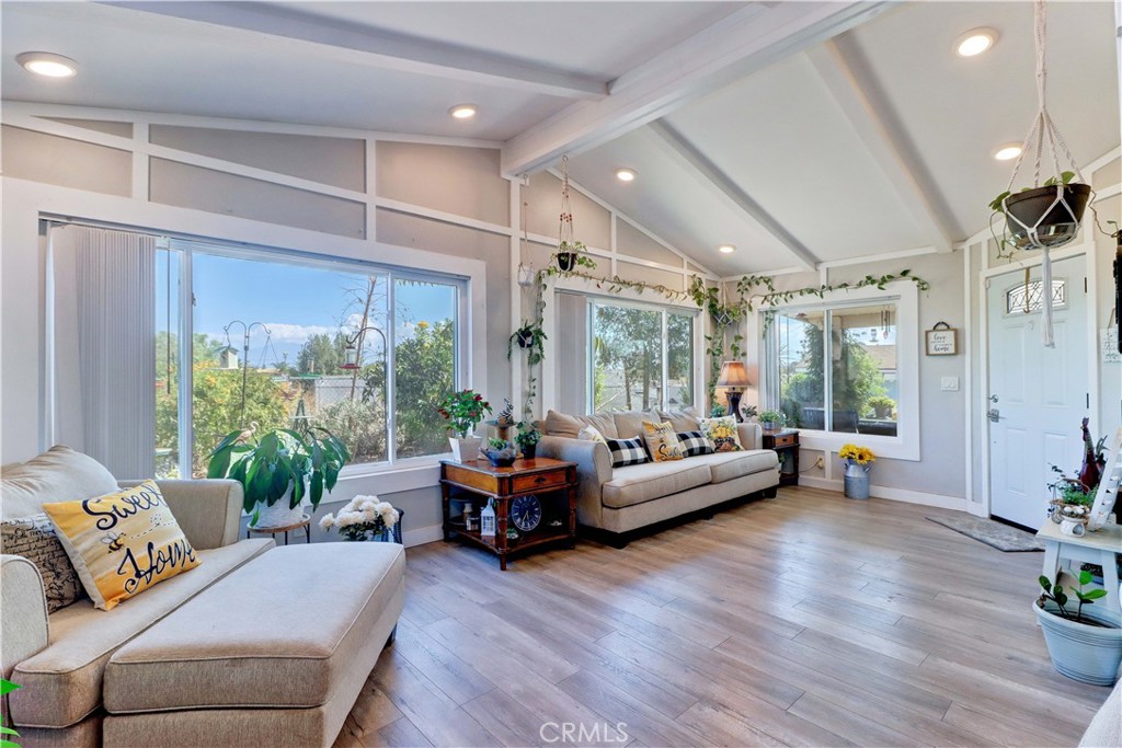 480 Deerhill Road Perris, CA 92570 - Photo 34 of 39 a living room with furniture and a large window