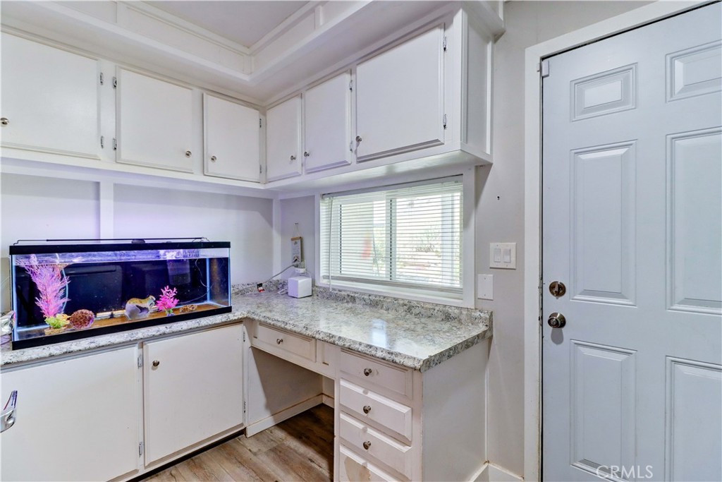 480 Deerhill Road Perris, CA 92570 - Photo 39 of 39 a kitchen with stainless steel appliances granite countertop a stove and a white cabinets