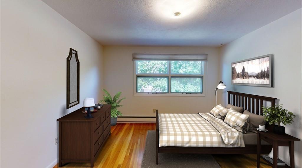 95 Peregrine Road Newton, MA 02459 - Photo 8 of 14 a bedroom with furniture and a window