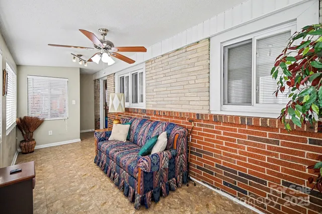 a view of balcony with furniture