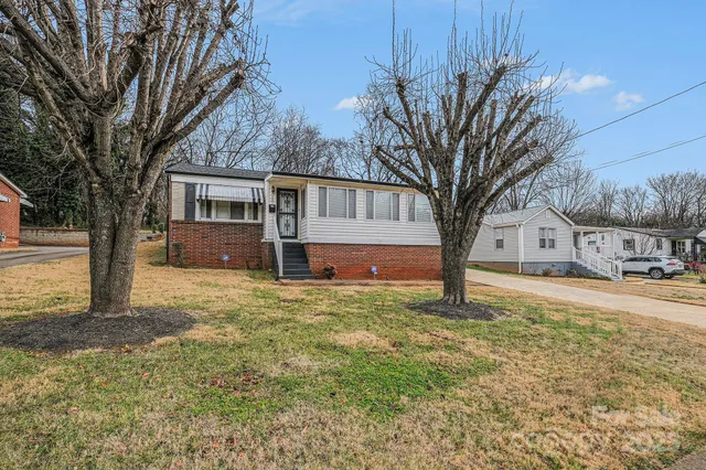 a house with trees in front of it