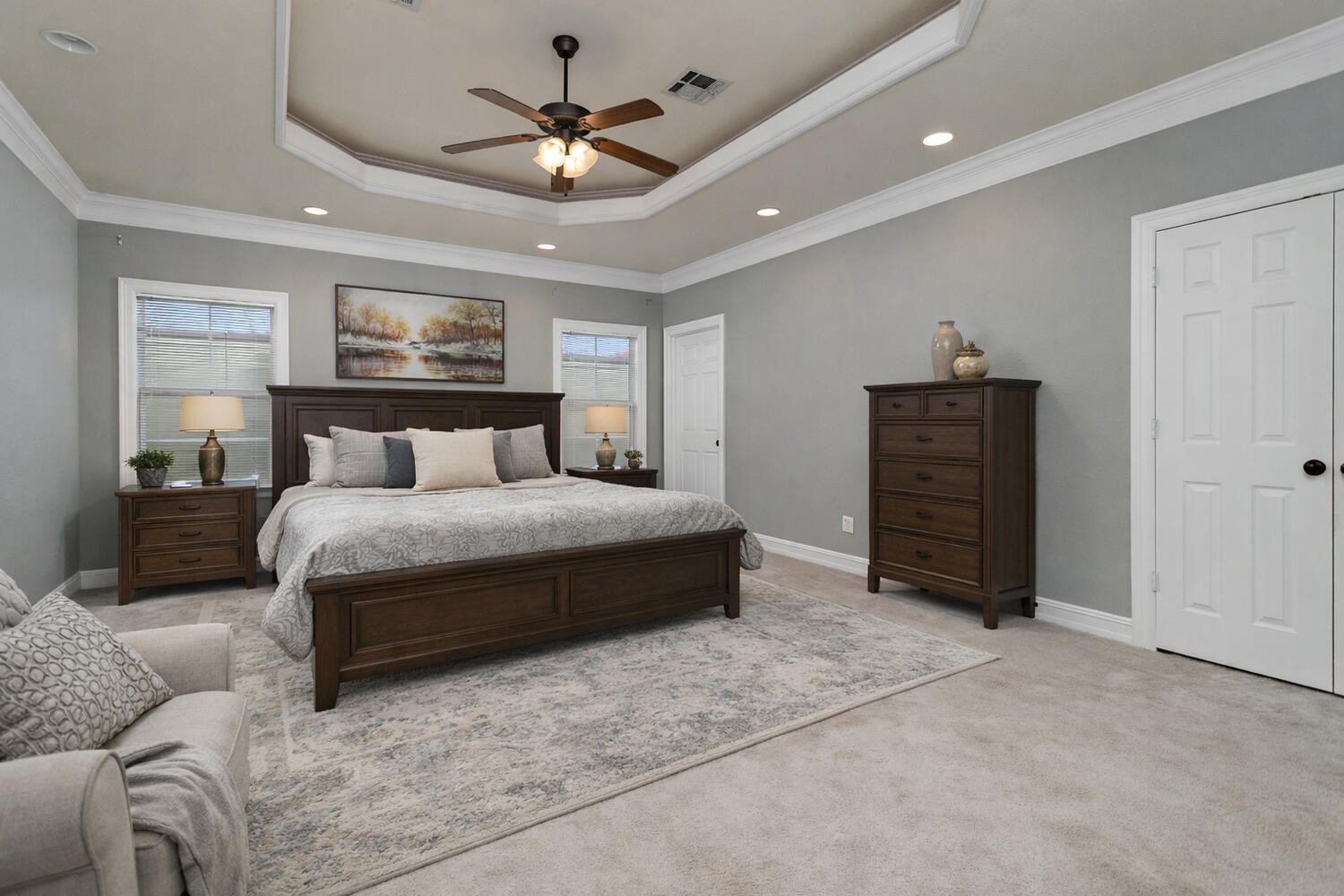 6461 Bell Pointe Beaumont, TX 77706 - Photo 20 of 33 a bedroom with a bed and a chandelier