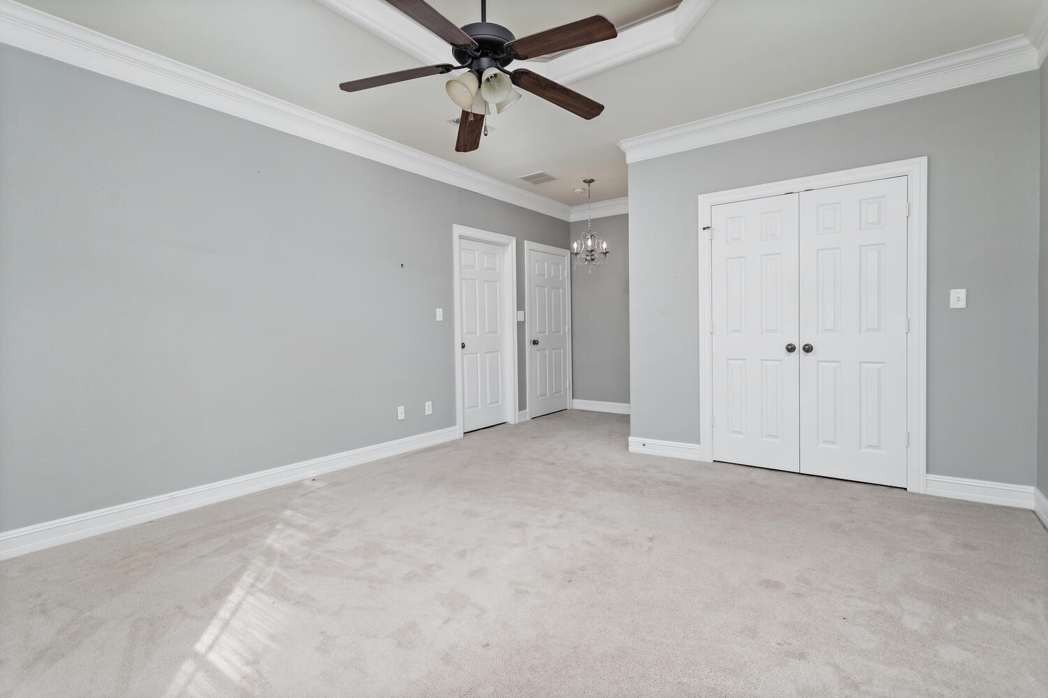 6461 Bell Pointe Beaumont, TX 77706 - Photo 25 of 33 an empty room with chandelier fan