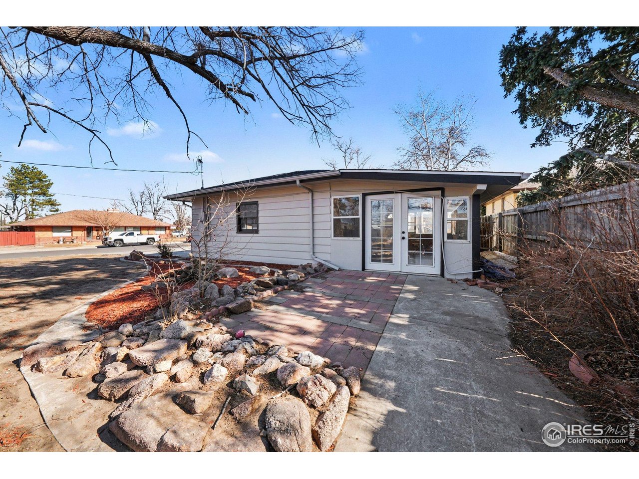 2202 17th Street Greeley, CO 80631 - Photo 30 of 36 a view of a backyard with a sitting area
