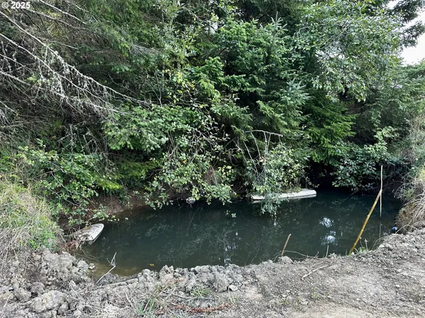 a view of a wooden floor and a lake view