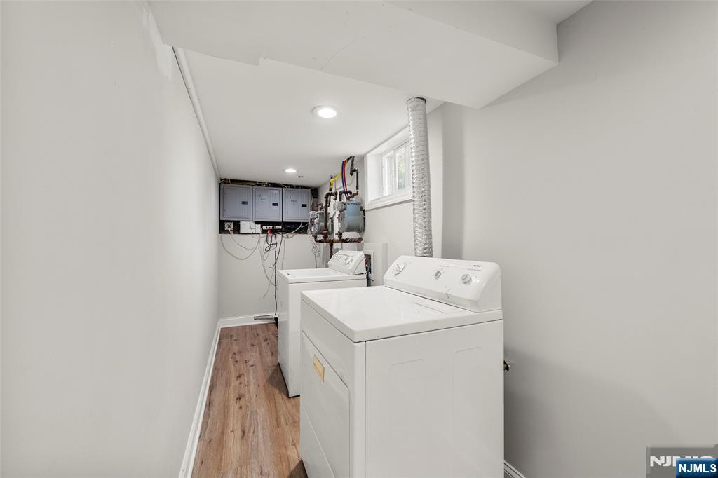 267 Hirliman Road Englewood, NJ 07631 - Photo 14 of 16 a utility room with dryer and washer