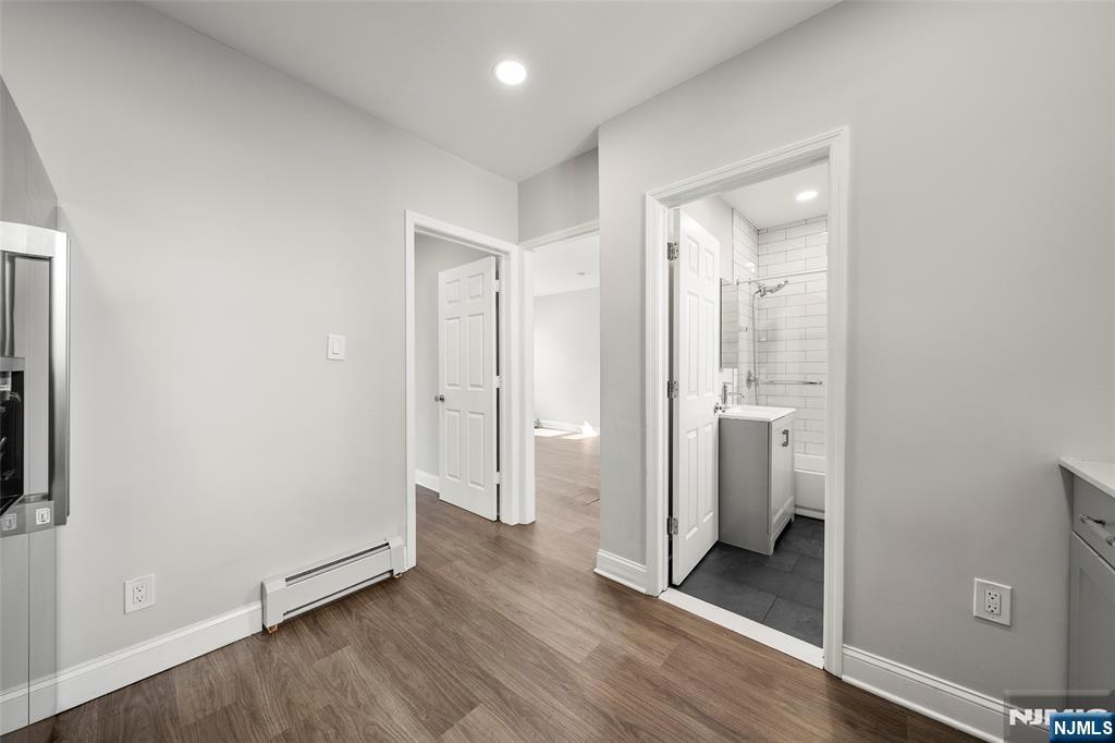 267 Hirliman Road Englewood, NJ 07631 - Photo 8 of 16 a view of a bathroom with wooden floor