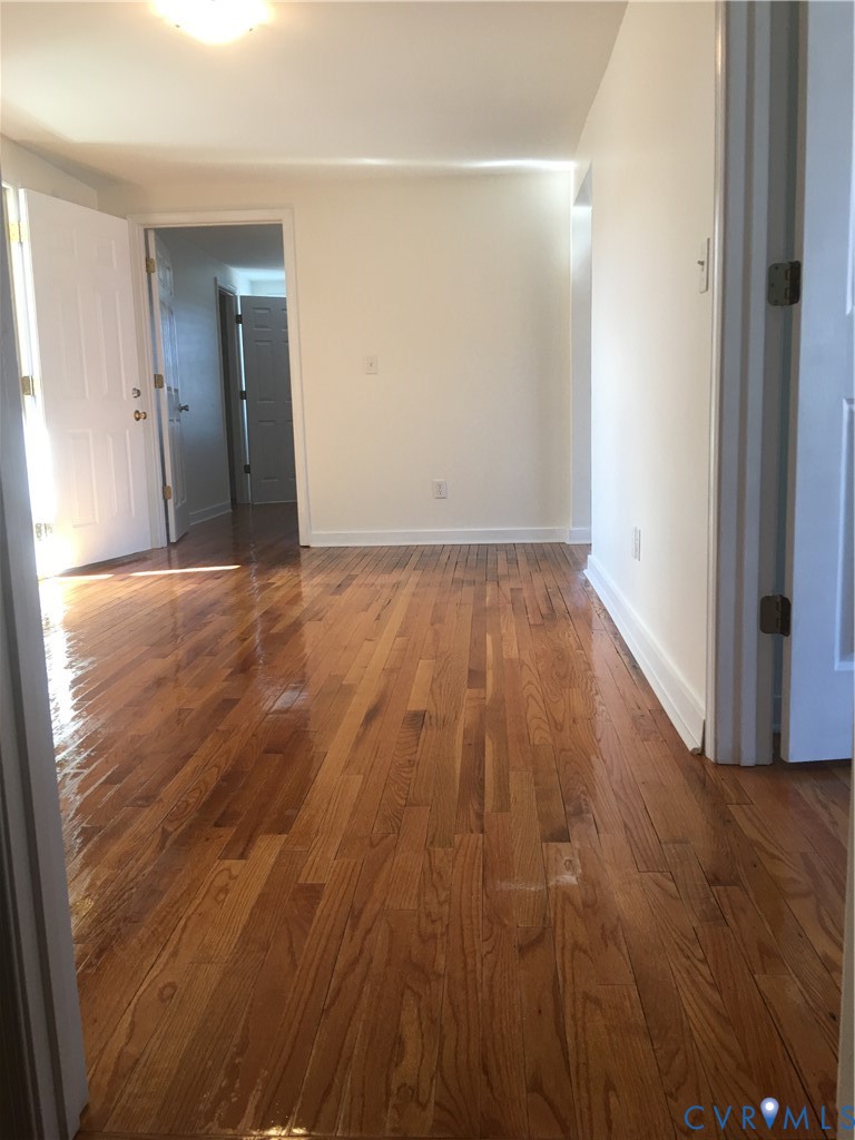 1002 Main Street Dillwyn, VA 23936 - Photo 9 of 16 wooden floor in an empty room