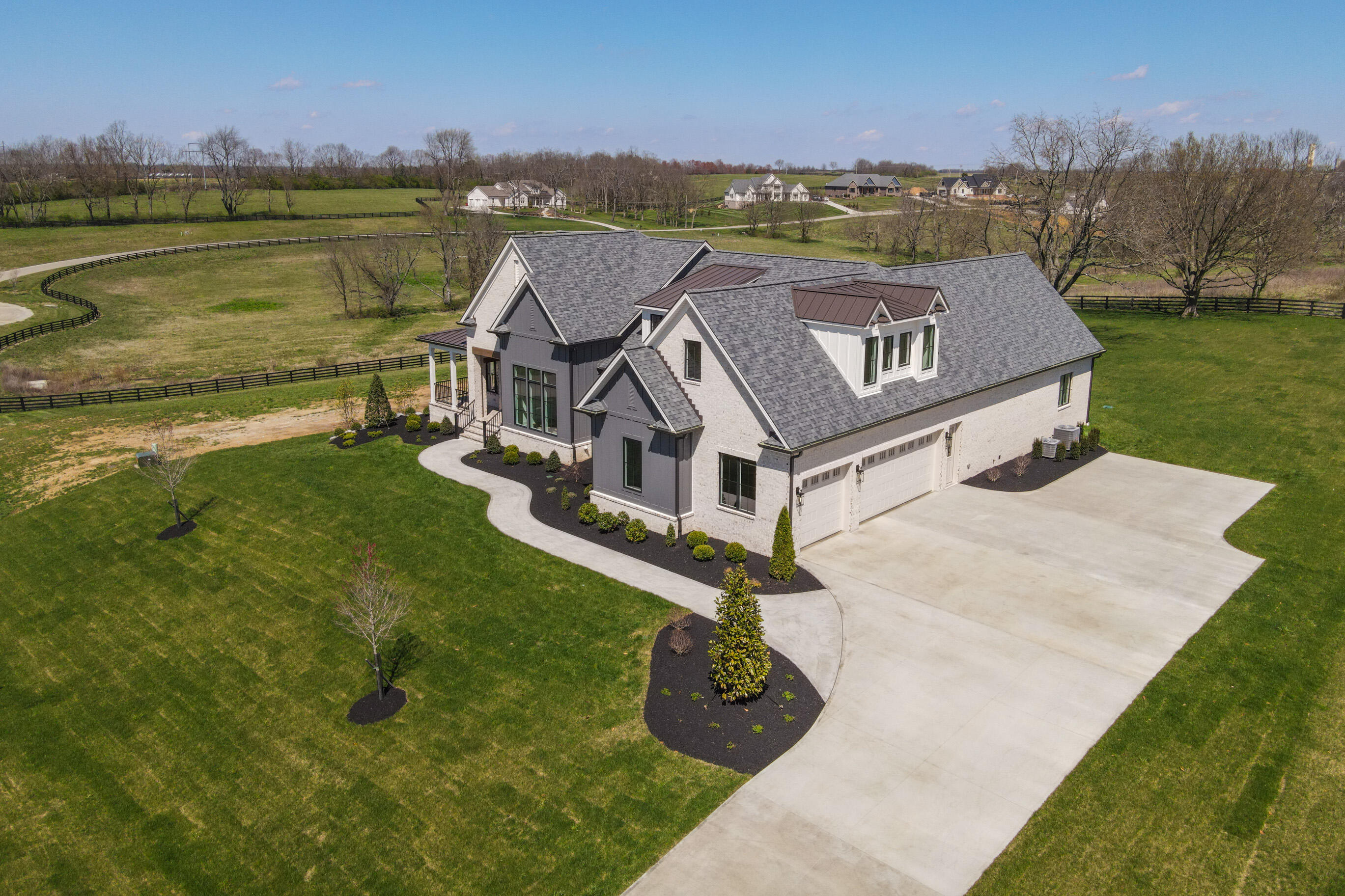 213 Doe Road Lexington, KY 40515 - Photo 3 of 67 20240328-213-Doe-Run-drone-tem-002_web