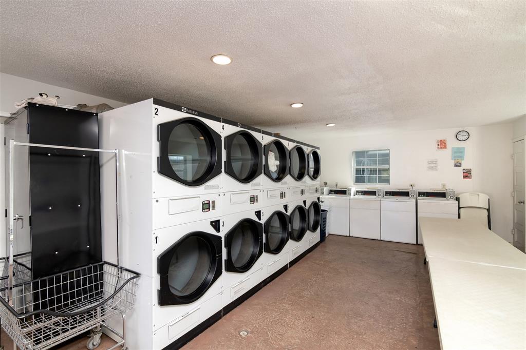 7064 Glenview Drive, Unit 92 North Richland Hills, TX 76180 - Photo 5 of 11 a view of a kitchen and utility room