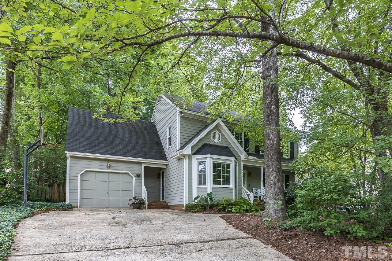 7309 Glendower Road Raleigh, NC 27613 - Photo 1 of 19 a front view of a house with garden