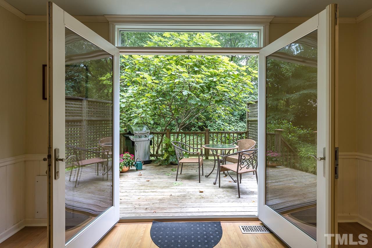 7309 Glendower Road Raleigh, NC 27613 - Photo 12 of 19 a balcony with furniture and a porch