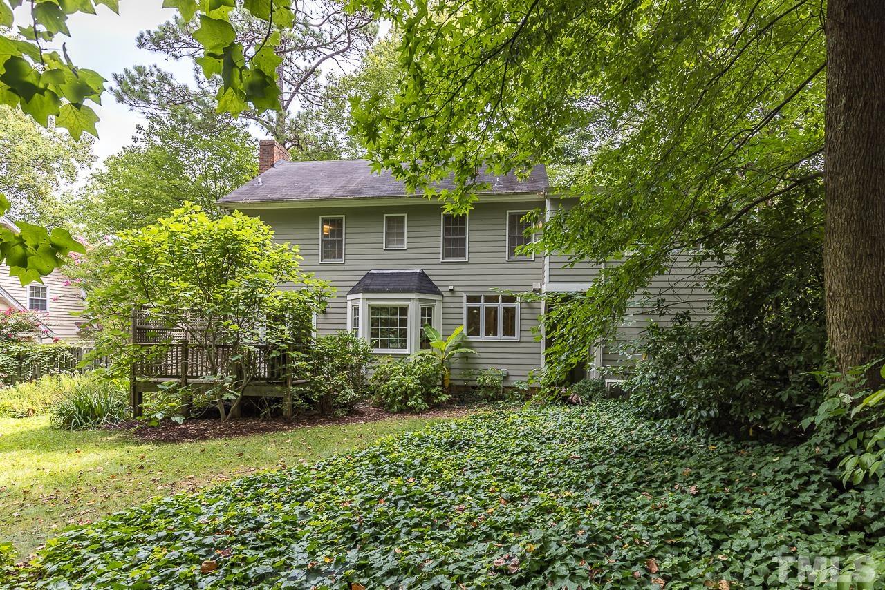 7309 Glendower Road Raleigh, NC 27613 - Photo 18 of 19 a front view of a house with a yard