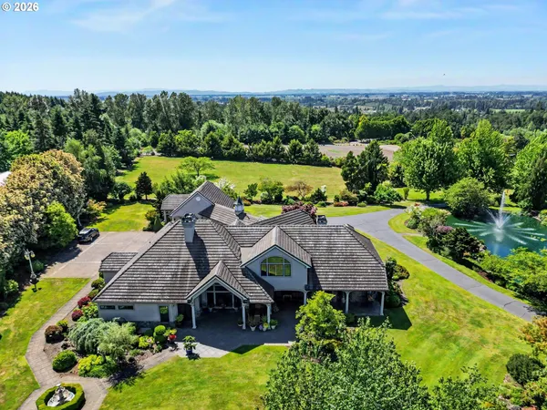 an aerial view of a house with a garden