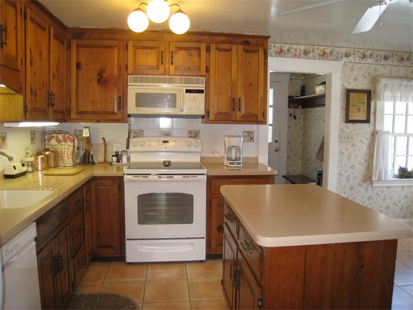 207 Cordaville Road Ashland, MA 01721 - Photo 3 of 29 a kitchen with a sink cabinets and stainless steel appliances