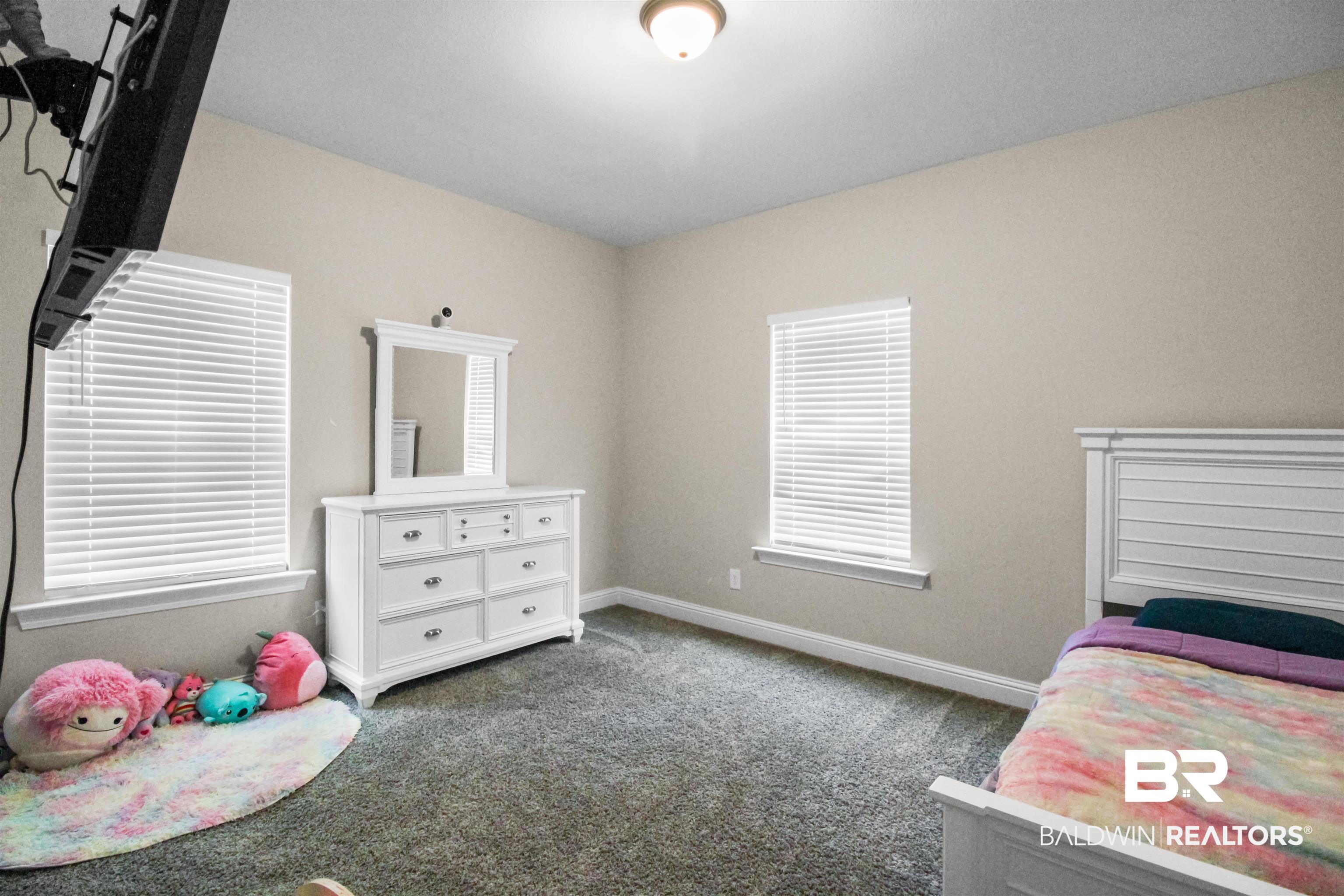 26197 Eagle Trace Elberta, AL 36530 - Photo 22 of 26 Bedroom featuring dark carpet