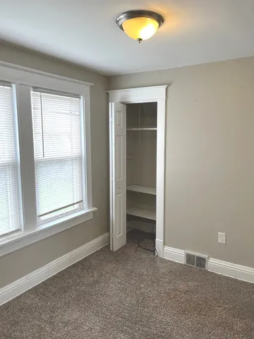 an empty room with window