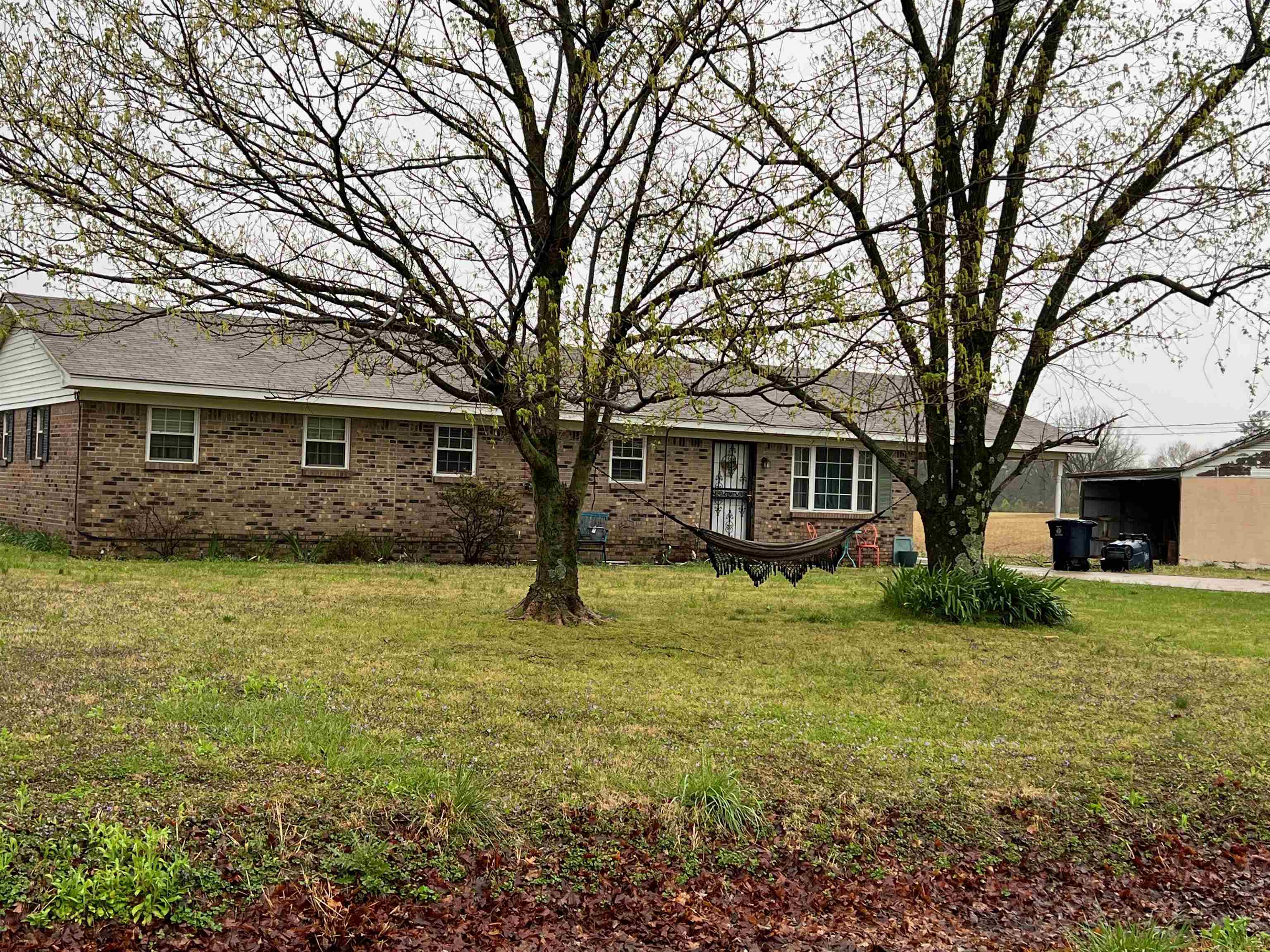 1947 Curve Nankipoo Road Ripley, TN 38063 - Photo 1 of 1 a front view of a house with a yard
