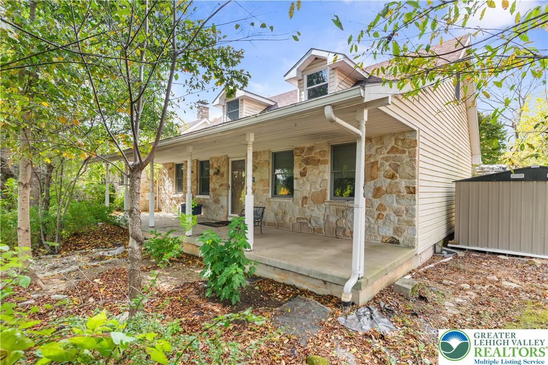 a front view of a house with a porch