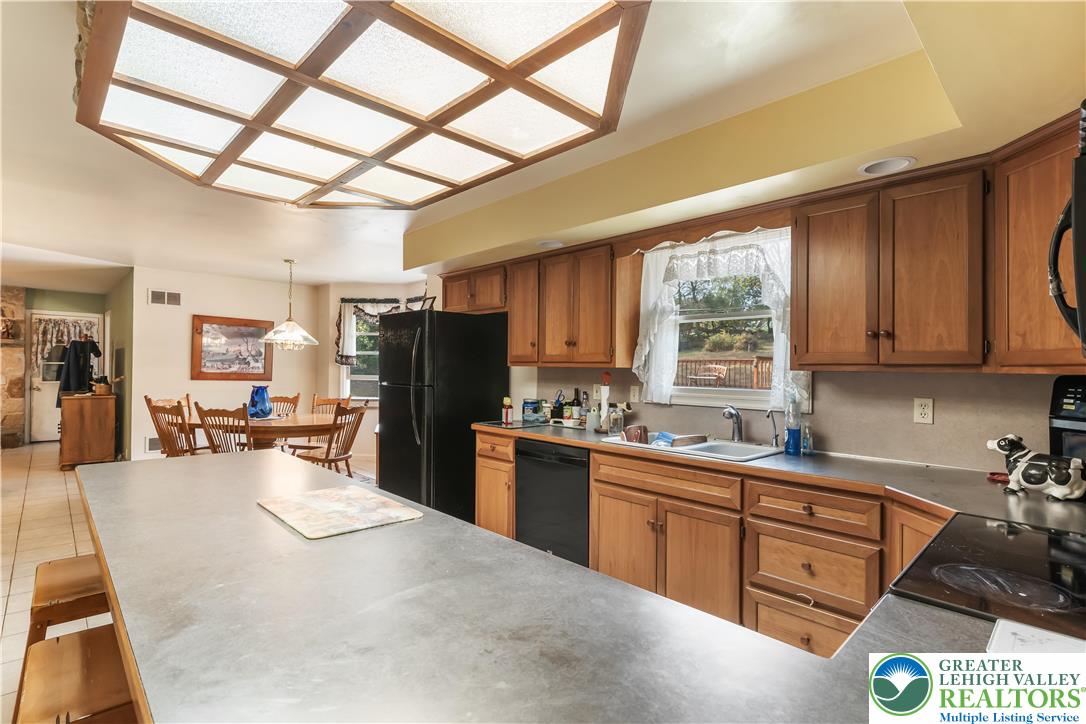 390 Long Lane Road Walnutport, PA 18088 - Photo 17 of 56 a kitchen with lots of counter top space and refrigerator