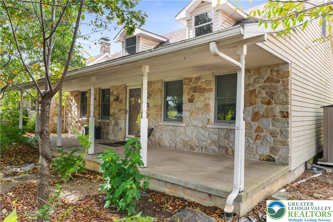 390 Long Lane Road Walnutport, PA 18088 - Photo 2 of 56 front view of a house with a porch