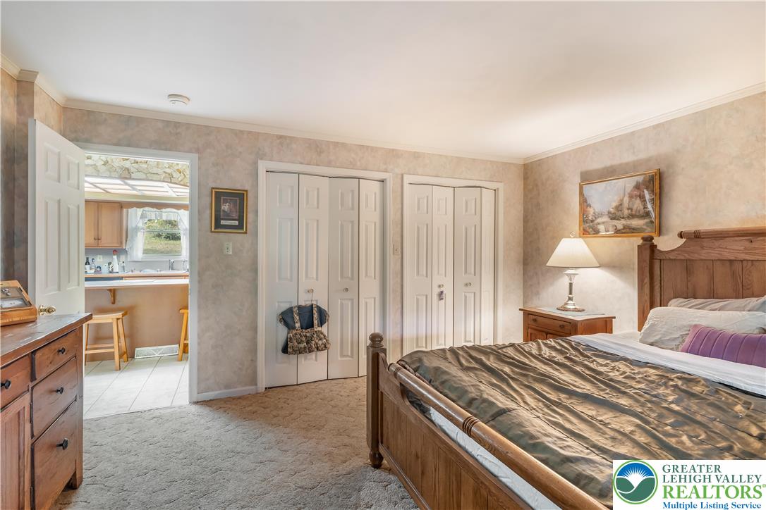 390 Long Lane Road Walnutport, PA 18088 - Photo 23 of 56 a bedroom with a bed and a window