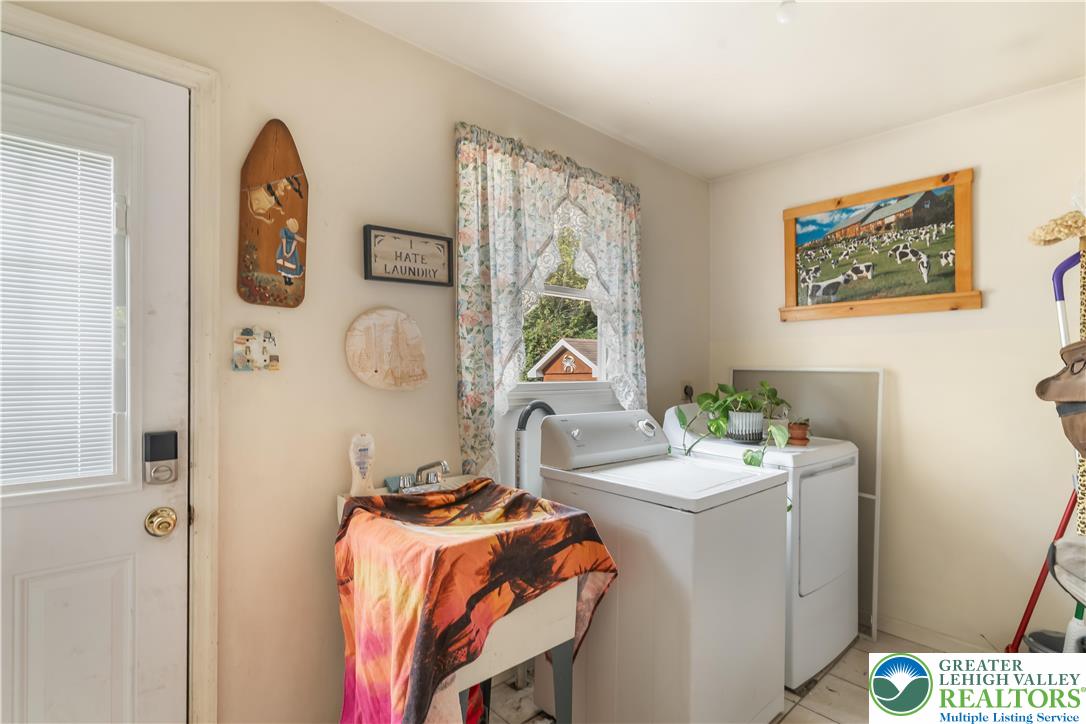 390 Long Lane Road Walnutport, PA 18088 - Photo 27 of 56 a bedroom with a bed and a window