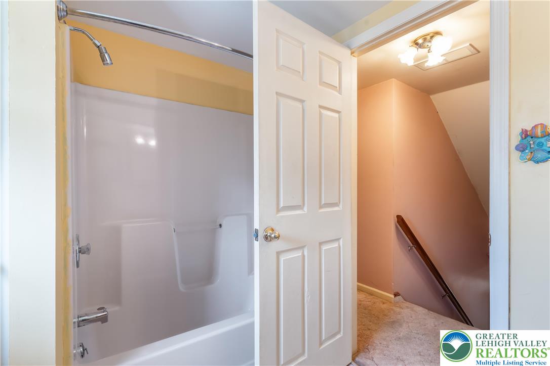 390 Long Lane Road Walnutport, PA 18088 - Photo 31 of 56 a bathroom with a bathtub and a shower