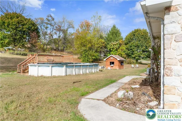 a house with trees in the background