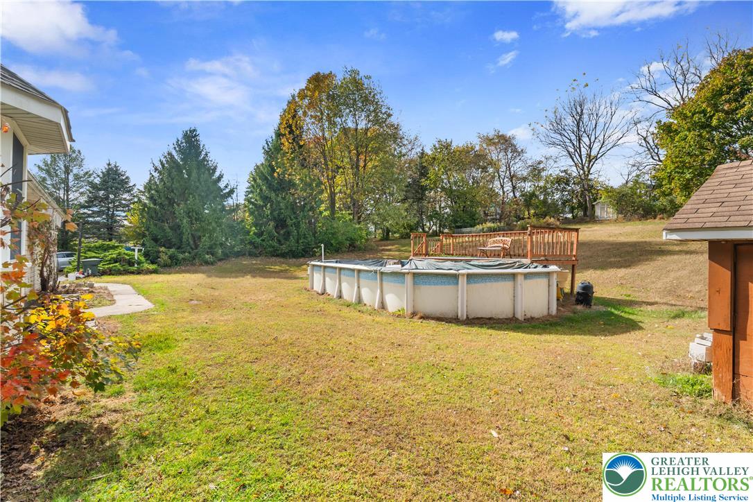 390 Long Lane Road Walnutport, PA 18088 - Photo 39 of 56 a view of a swimming pool with an ocean view