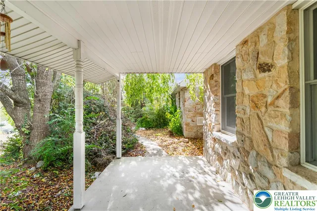 a view of a back yard from a room