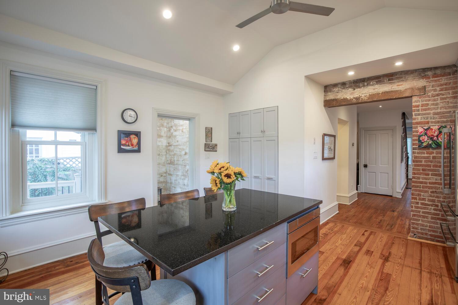 121 Cottage Street Doylestown, PA 18901 - Photo 11 of 46 a kitchen with a table chairs and wooden floor