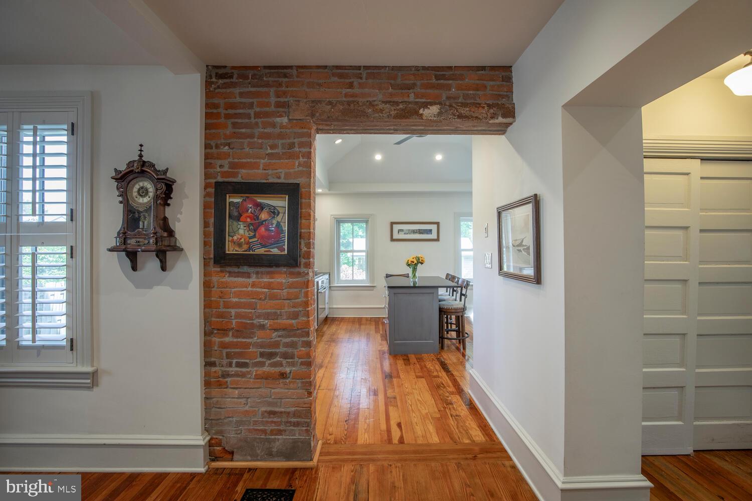 121 Cottage Street Doylestown, PA 18901 - Photo 14 of 46 a view of a hallway with wooden floor and a living room