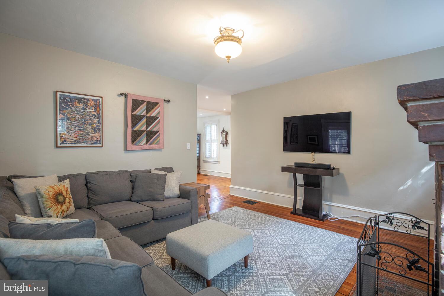 121 Cottage Street Doylestown, PA 18901 - Photo 17 of 46 a living room with furniture and a flat screen tv
