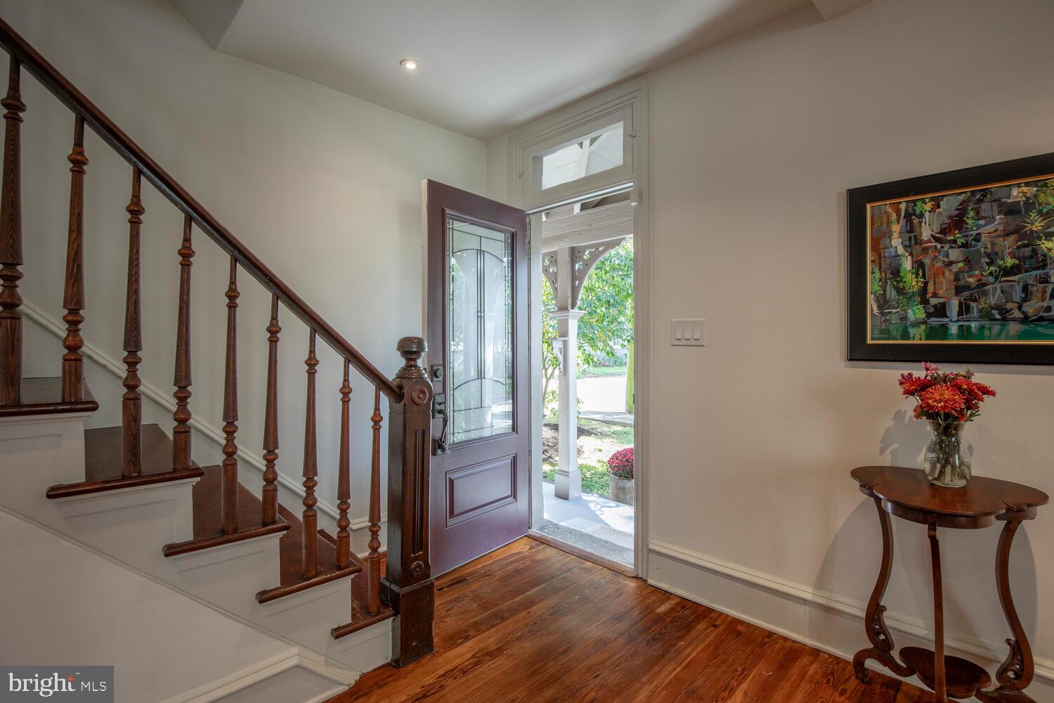 121 Cottage Street Doylestown, PA 18901 - Photo 3 of 46 a view of a hallway with wooden floor and staircase