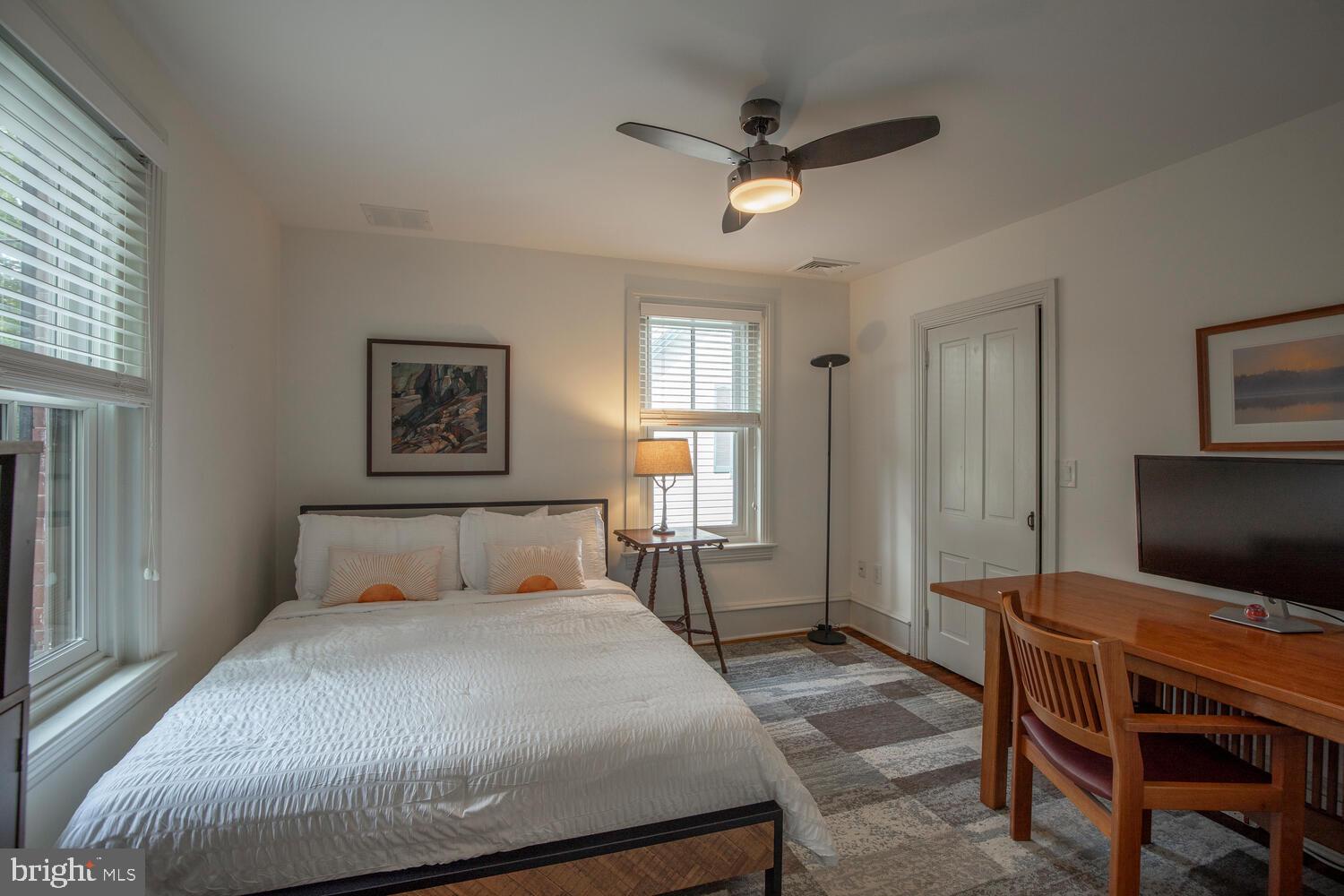 121 Cottage Street Doylestown, PA 18901 - Photo 33 of 46 a bedroom with a bed and a flat screen tv