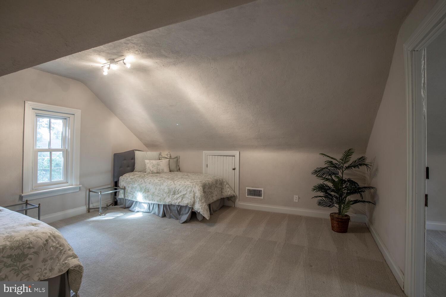 121 Cottage Street Doylestown, PA 18901 - Photo 35 of 46 a spacious bedroom with a bed and a window