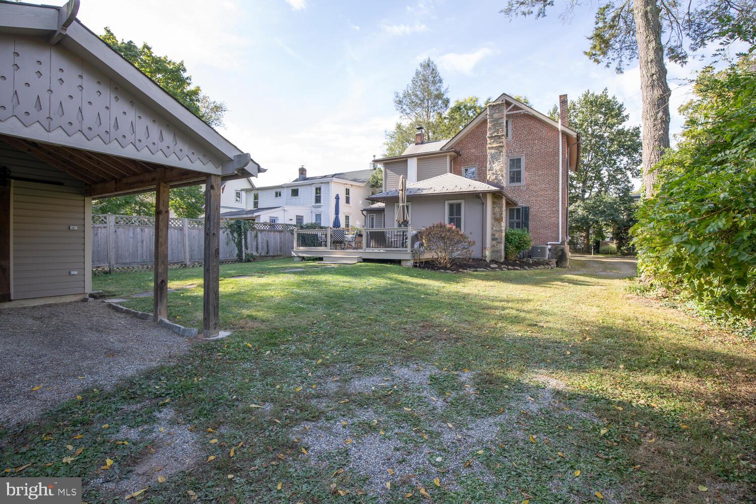 121 Cottage Street Doylestown, PA 18901 - Photo 44 of 46 a view of a big house with a big yard and large trees
